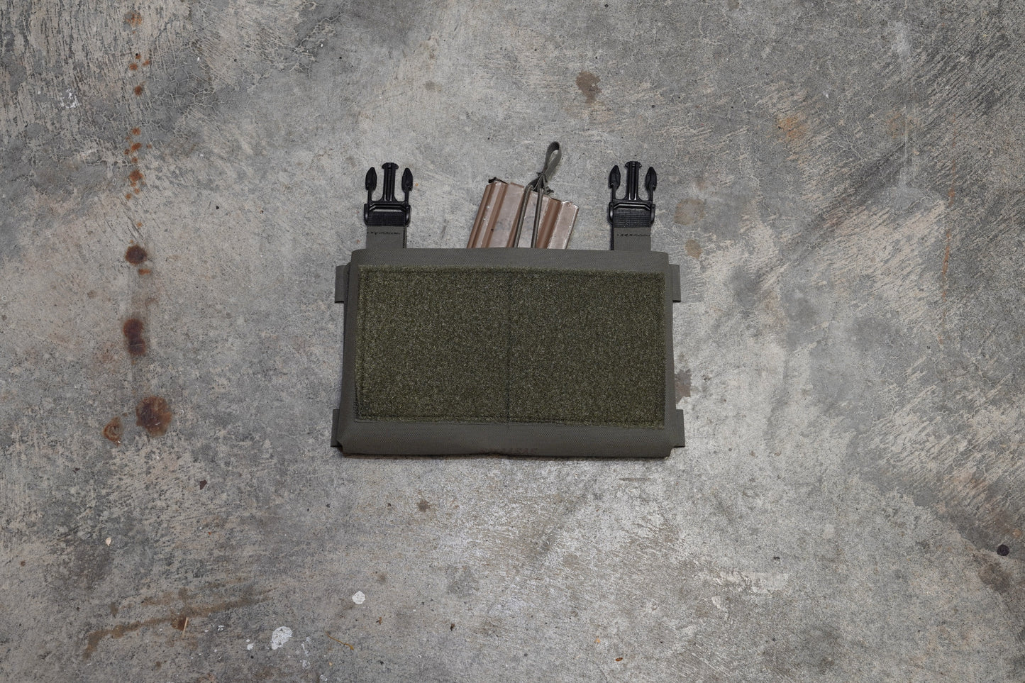 Bungee Mag Retention shown when in use over one magazine, inside of the Placard 1.