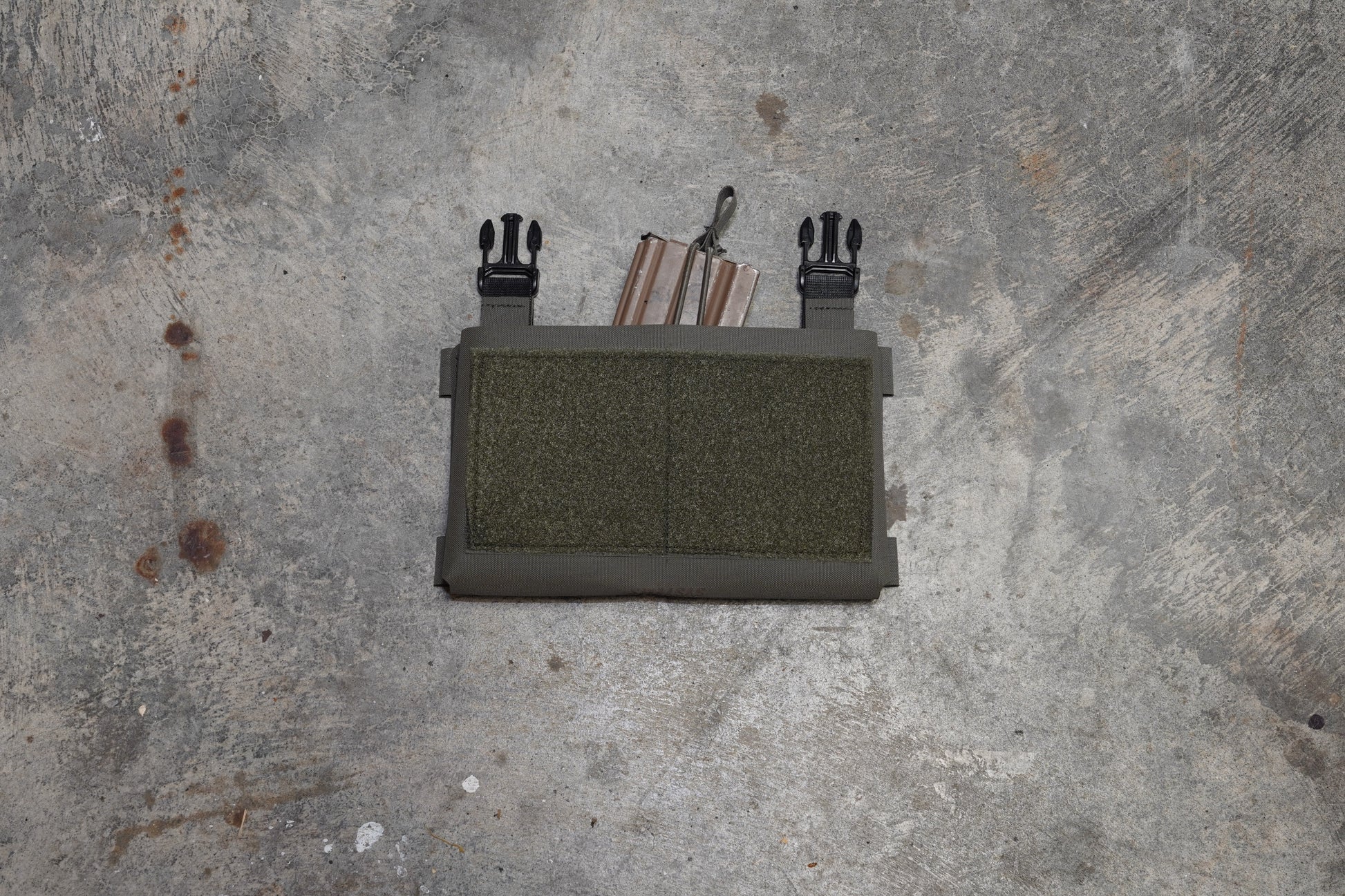 Bungee Mag Retention shown when in use over one magazine, inside of the Placard 1.