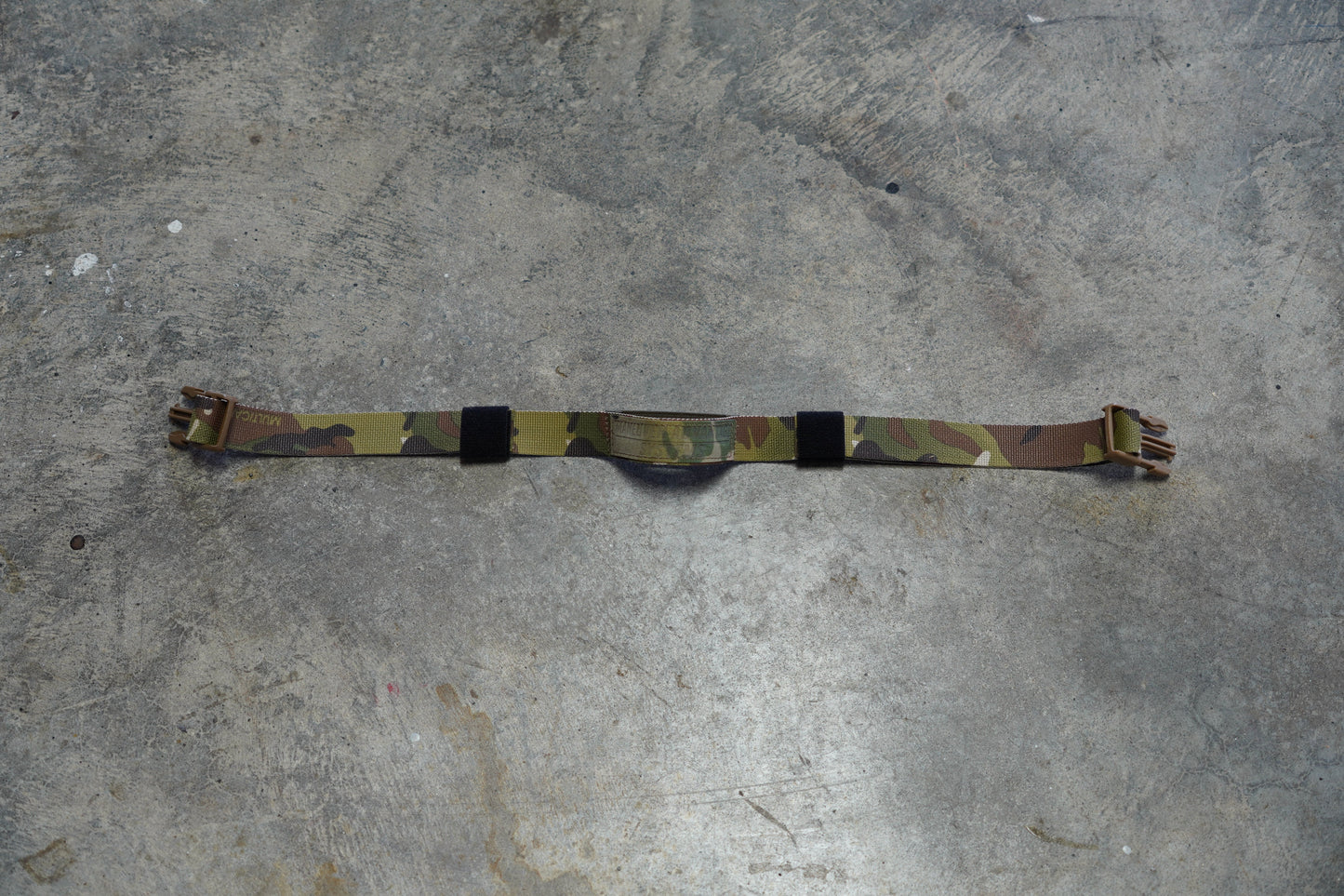 Multicam chest rig back strap by Maneuver Advantage Systems with elastic center and adjustable VELCRO ONE-WRAP ends for a secure, stable fit