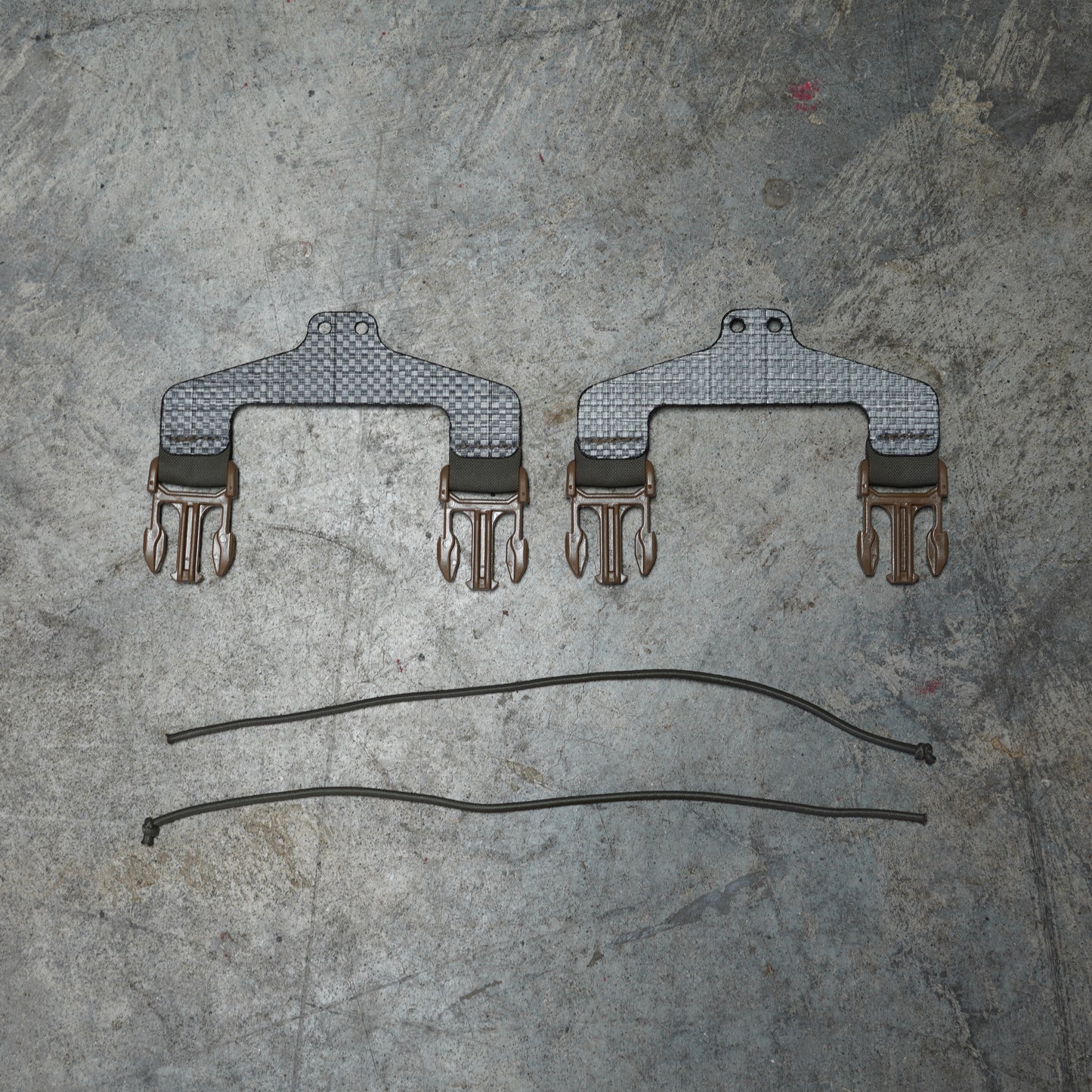 Bungee Placard Retention set by Maneuver Advantage Systems made from Berry-compliant B52 laminate, 6-layer Tegris, and IRR 1/8 inch bungee