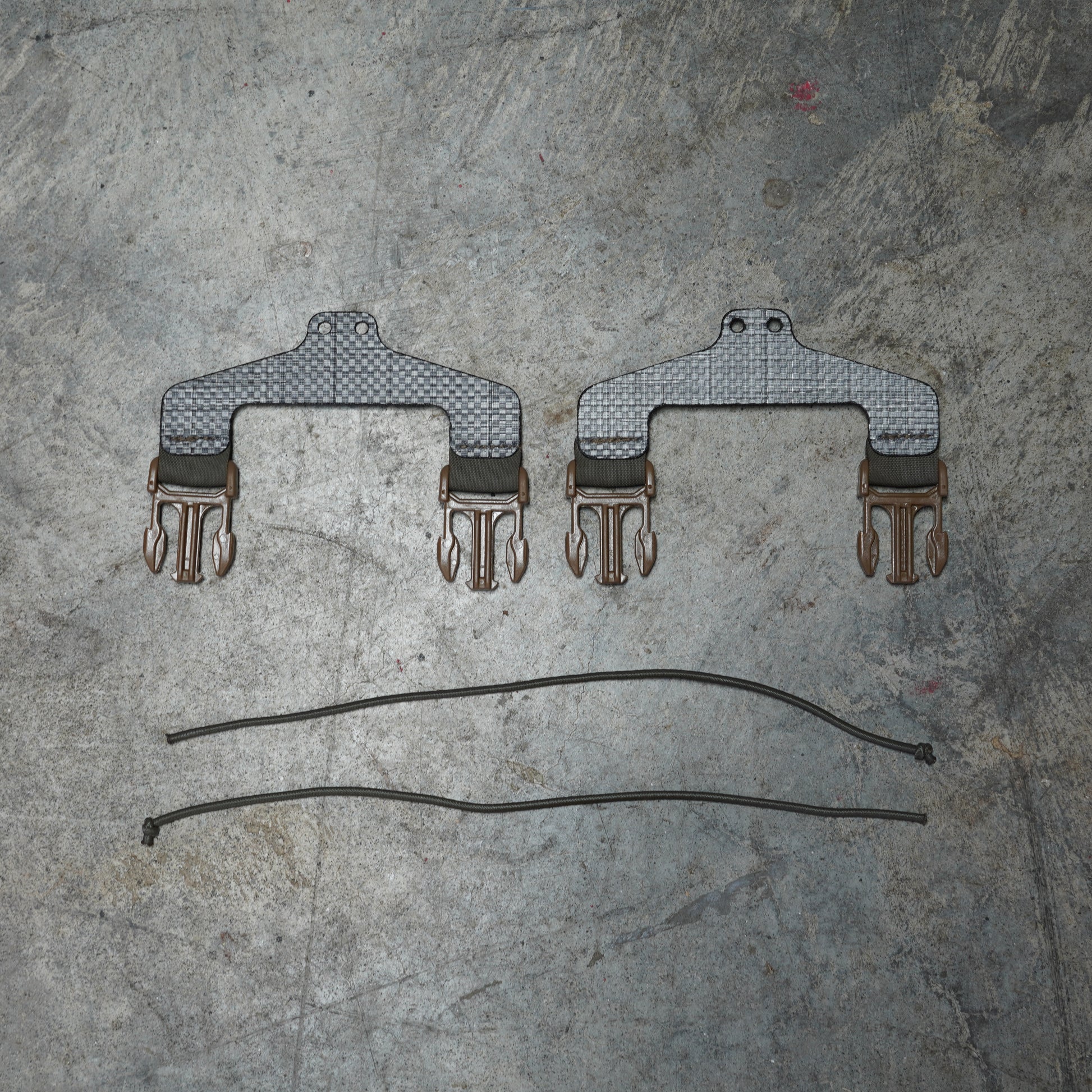 Bungee Placard Retention set by Maneuver Advantage Systems made from Berry-compliant B52 laminate, 6-layer Tegris, and IRR 1/8 inch bungee